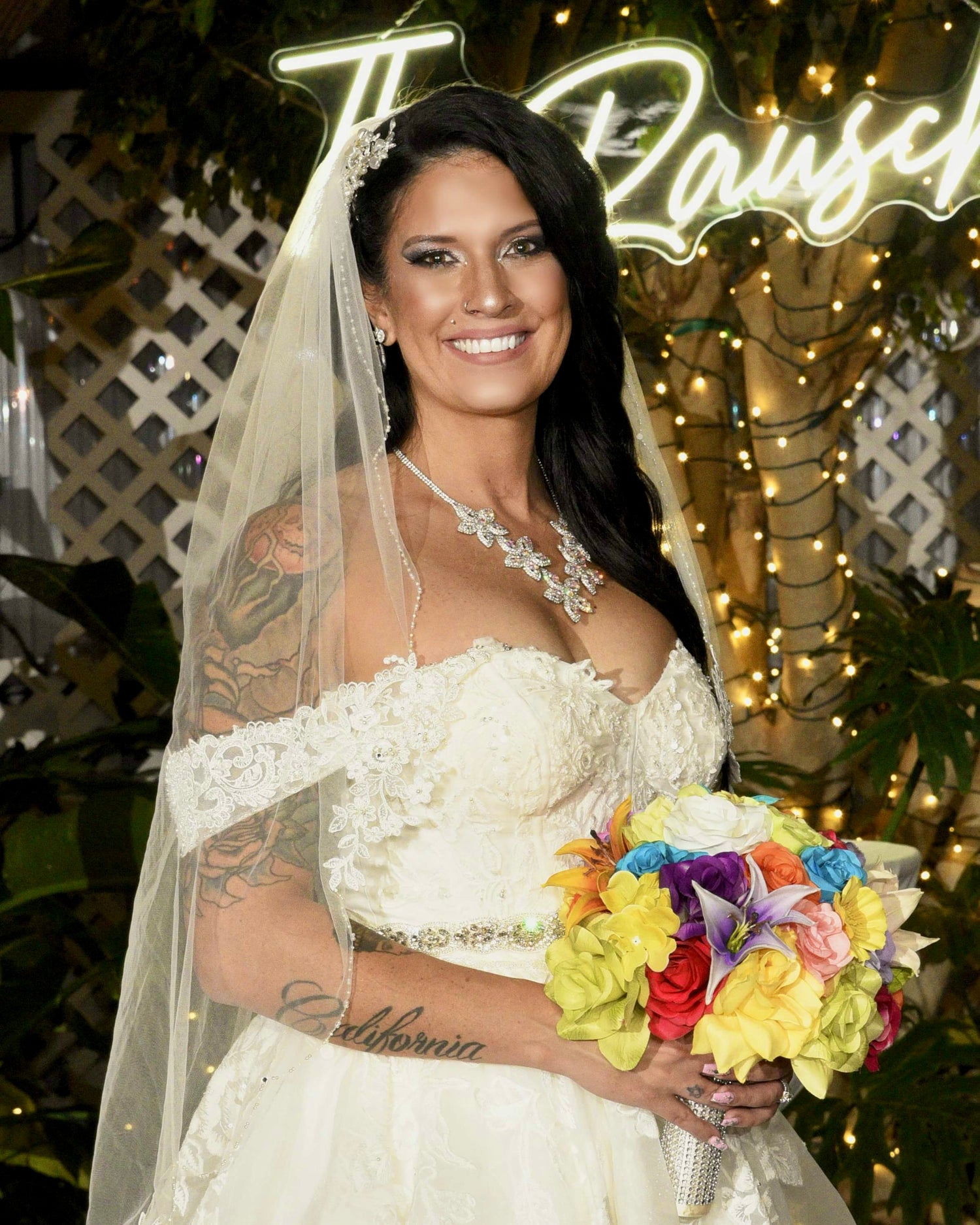 Las Vegas Airbrush Makeup Bride holding bouquet of colorful flowers, iAirbrush Makeup Studio